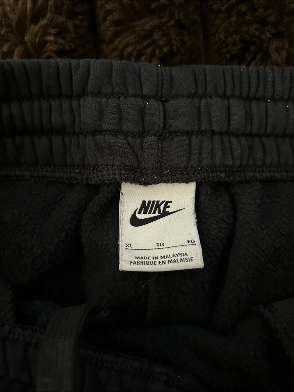 Nike Kids Black Sweatpants with White Swoosh